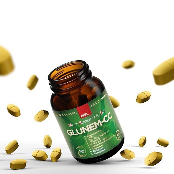 Glunem-CC bottle surrounded by tablets on white